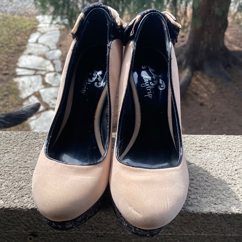 Cream and black felt high heels size 7.